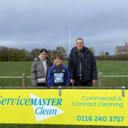 richard stood with ServiceMaster board Syson Rugby Club Leicester